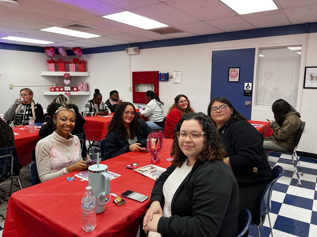Shades of Sisters students gathering together at a Galentine's Day event
